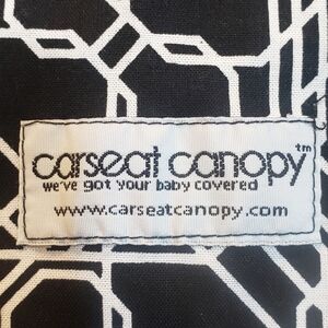 Carseat cover. New without tags.